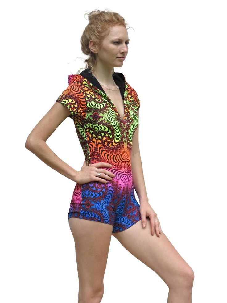 Free delivery to USA, Canada, UK, Europe, Australia & Japan! Hooded Playsuit : Rainbow Fractal Fully printed lycra hooded playsuit / romper with a lined hood. UV Active ! Cotton lycra fabric (95% cotton, 5% lycra) Please note, The pattern & colours can vary a bit, depending on which part of the fabric is used. Artwork by Space Tribe Sizes available, S/M. M/L For size guide see last photo. See all Space Tribe catsuits and capes here: https://www.etsy.com/shop/SpaceTribeClothing?ref=seller-platform-mcnav&section_id=19224858 or browse the Space Tribe etsy store to see our full selection of goodies: https://www.etsy.com/shop/SpaceTribeClothing Shipping weight : 0.40 kg. DELIVERY. All goods are shipped from Bali. We will need a telephone number for the courier to be able to deliver your package Rave Stretch Unitard For Festivals, Rave Style Stretch Unitard For Festivals, Rave Unitard With Stretch For Festivals, Rave Unitard With Stretch Fit For Festivals, Rave Bodysuit For Festival, Festival Stretch Rave Bodysuit, Stretch Rave Bodysuit For Festivals, Rave Style Stretch Bodysuit For Festivals, Multicolor Stretch Rave Unitard