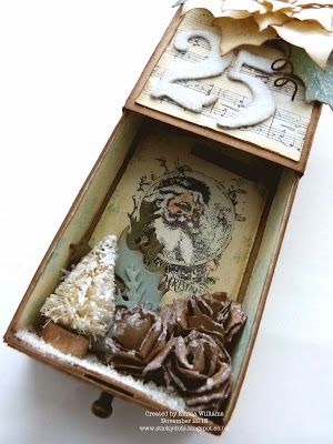 a box that has some decorations inside of it