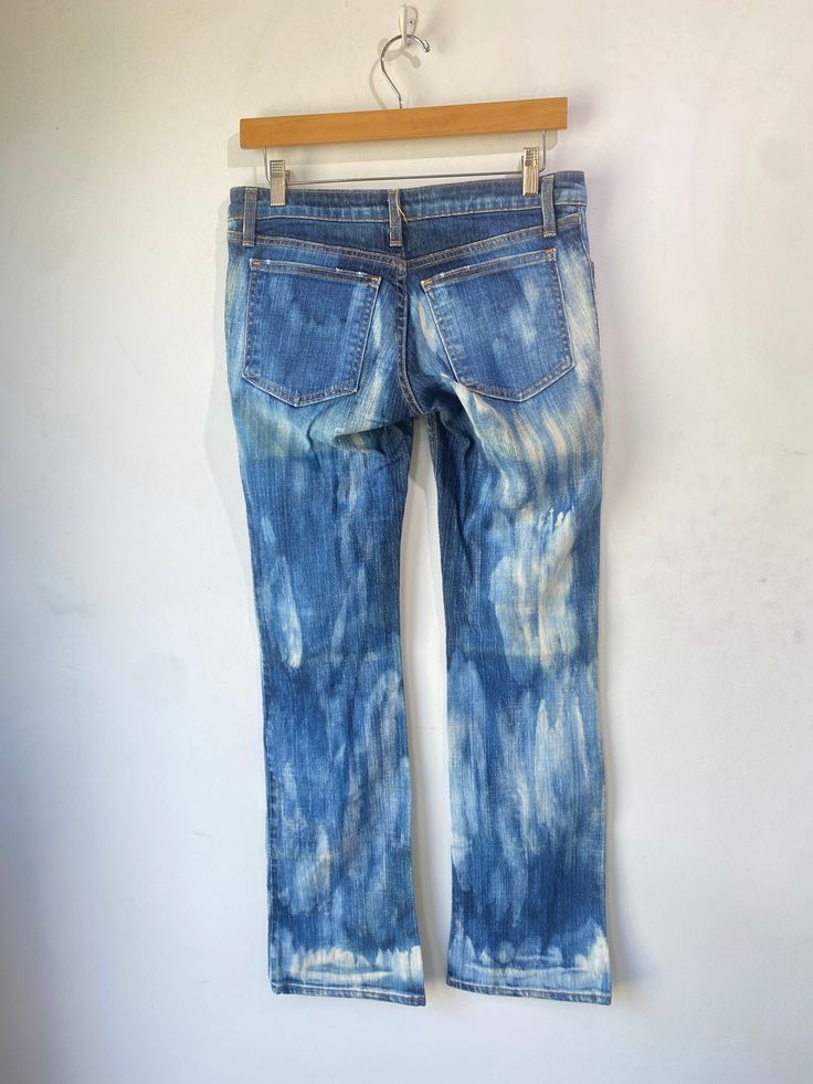 Built by Wendy Acid Wash Jeans! A fun denim piece in cotton blend with the perfect acid wash. Features a low-rise waist, zipper fly, and bootcut leg. Marked a size 28 and are in excellent condition! Approx. Measurements: Waist: 32" Rise: 6.5" Inseam: 32" Fitted Distressed Acid Wash Bottoms, Mid-rise Faded Cotton Flare Jeans, Fitted Pre-washed Blue Jeans, Fitted Mid-rise Acid Wash Bottoms, Fitted Faded Pre-washed Jeans, Stonewashed Fitted Straight Leg Jeans, Fitted Stonewashed Straight Leg Jeans, Fitted Cotton Stonewashed Bottoms, Fitted Stonewashed Cotton Bottoms