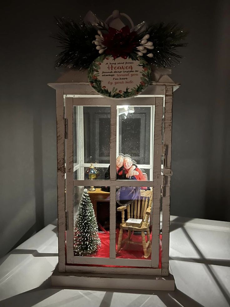 a christmas display in the corner of a room