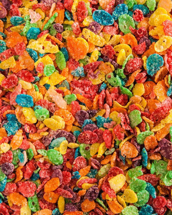 colorful candy flakes are scattered on top of each other in this image, there is no image here to provide a caption for