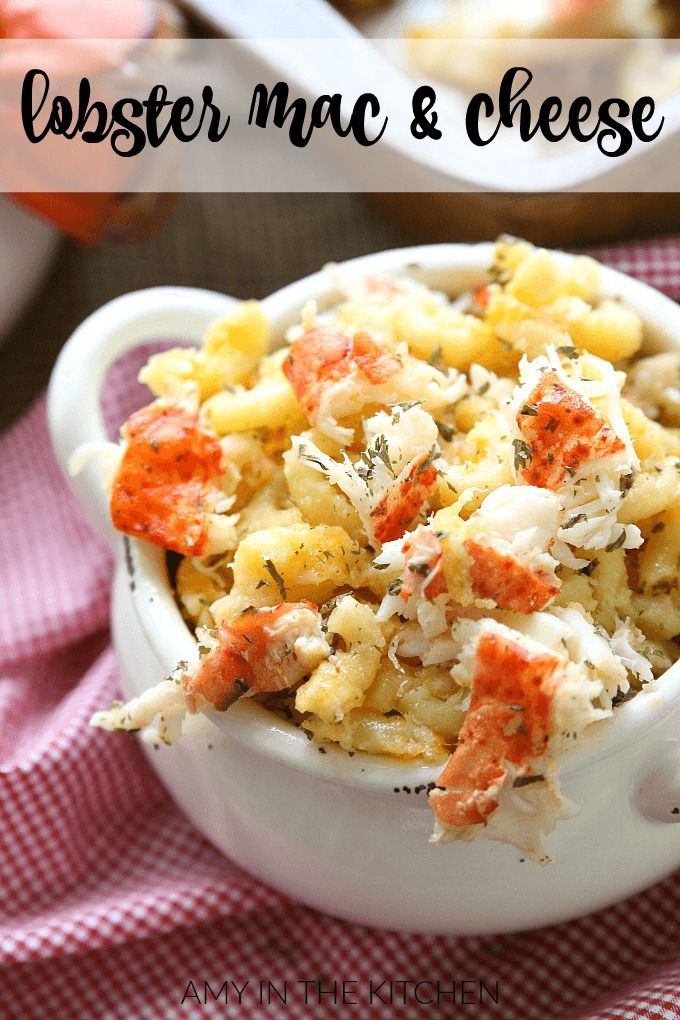 a white bowl filled with food on top of a red and white checkered table cloth