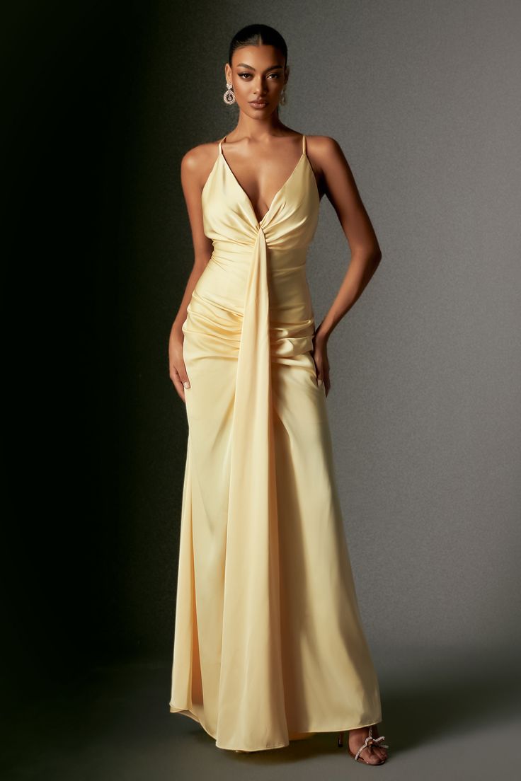 Embrace an unforgettable sophistication with our Ock Deep V Halter Satin Maxi Dress! Crafted from luxurious satin fabric, this dress features a chic deep V-neckline and a halter design, complemented by a striking thigh-high split that adds a bold and flirtatious touch. To complete your look, pair it with simple gold jewelry and elegant high heels to accentuate its sophisticated charm.    Model wearing size S  Model Stats:Height - 68.9”/175 cm Bust - 34.6”/88cm Hips - 36.2”/92 c Silk Satin V-neck Dress With Fitted Bodice, Chic Satin Dress With Fitted Bodice And V-neck, Elegant Halter Neck Satin Evening Dress, Evening Satin Dress With Bias Cut And V-neck, Ruched V-neck Satin Dress For Formal Occasions, Bias Cut Satin V-neck Dress For Evening, Bias Cut Satin Dress With V-neck For Evening, Prom Satin V-neck Dress With Bias Cut, V-neck Bias Cut Evening Dress For Gala