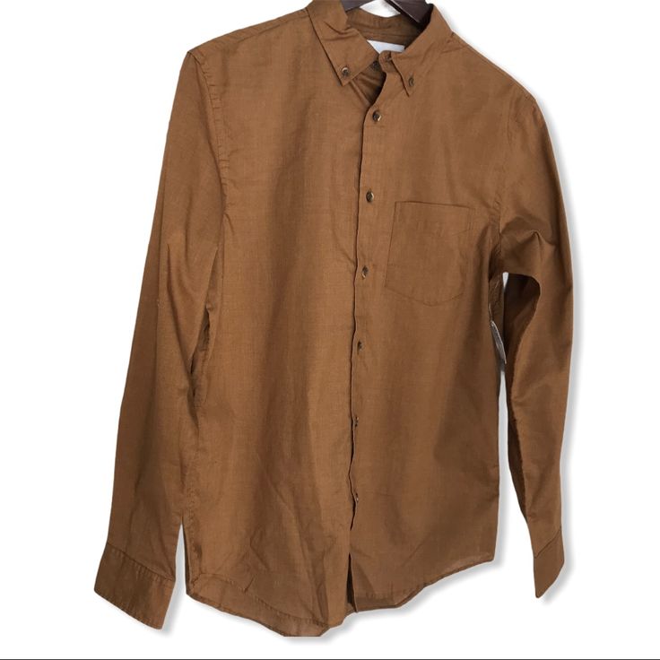 Old Navy Slim Fit Button Down. Chest:20” New With Tag. Casual Brown Top With Buttoned Pockets, Brown Long Sleeve Shirt With Buttons, Casual Brown Tops With Button Cuffs, Brown Workwear Tops With Button Closure, Classic Brown Tops With Button Closure, Brown Tops With Button Closure For Work, Brown Button Closure Tops For Work, Everyday Brown Cotton Shirt, Brown Shirt With Button Cuffs For Spring