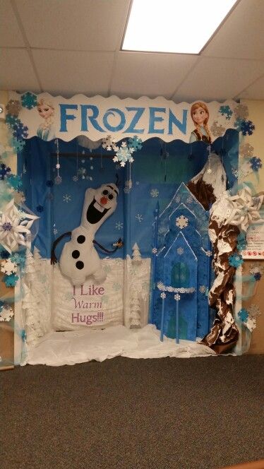 an office cubicle decorated with frozen decorations