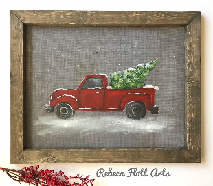 a painting of a red truck with a christmas tree in the bed is on display