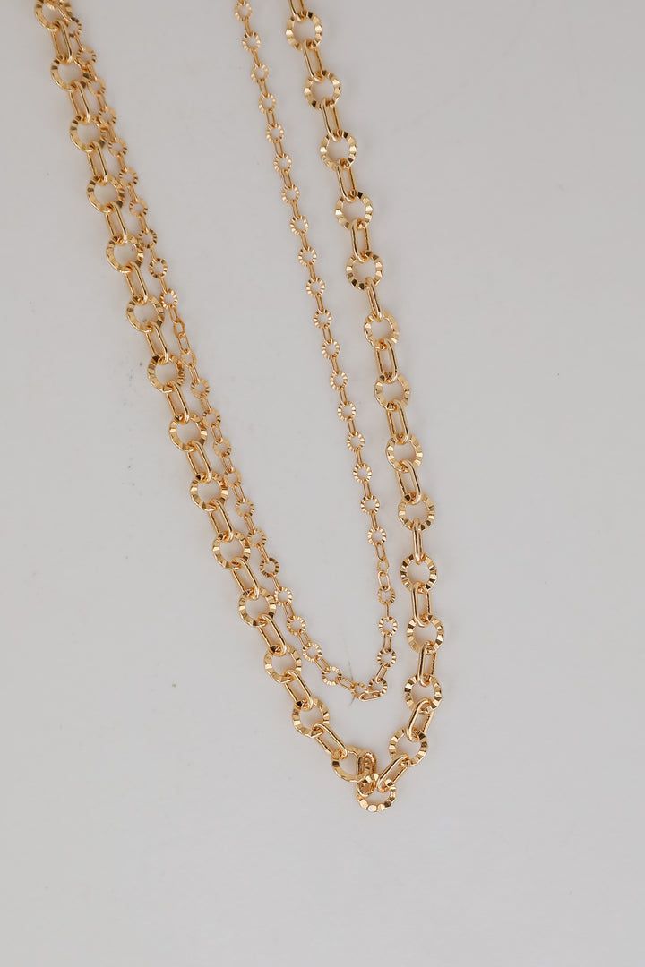 Women's Gold Layered Chain Necklace Trendy Double Chain Necklace For Layering, Gold Layered Chain Link Necklace, Chic Gold Layered Necklace With Chunky Chain, Gold Layered Necklace With Chunky Chain Links, Trendy Double Strand Gold Chain Necklace, Trendy Gold Layered Choker Necklace, Trendy Gold Chain Necklace For Layering, Chic Gold-tone Double Chain Layered Necklace, Trendy Gold-tone Layered Necklace