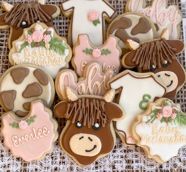 some decorated cookies are sitting on a table