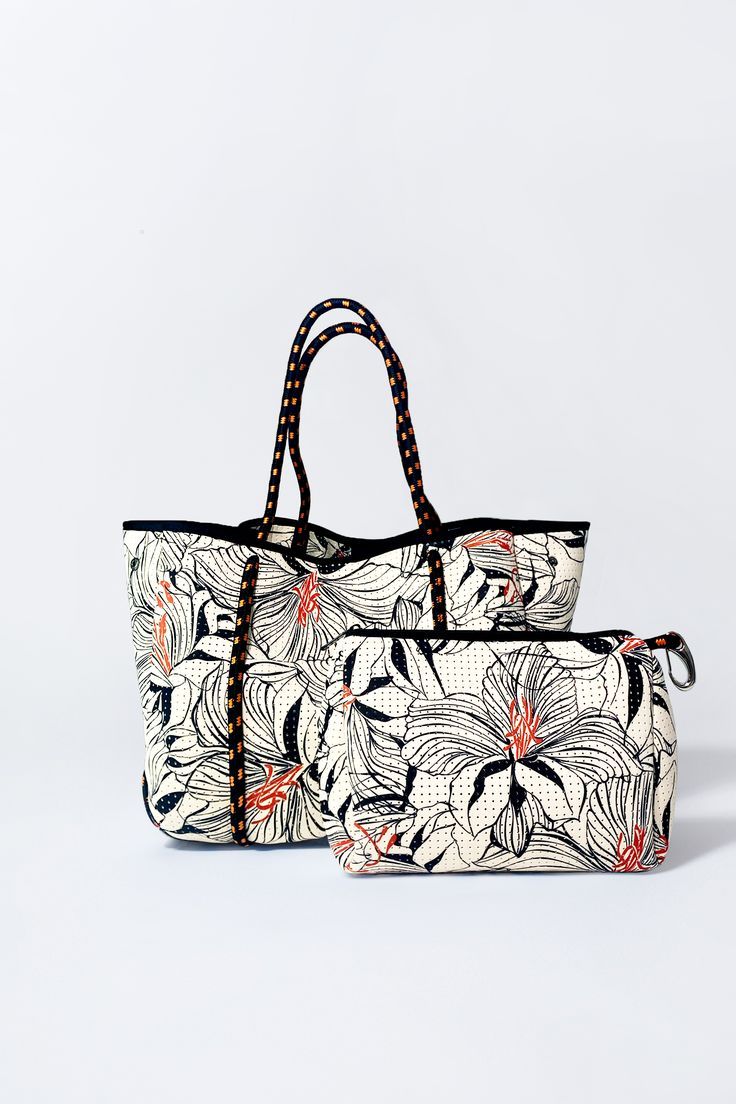 Introducing our exclusive Hibiscus Tote + Pouch Set Bundle – a fusion of tropical allure and practical elegance. Immerse yourself in the vibrant beauty of hibiscus blooms with our meticulously designed tote, adorned with stunning floral patterns that evoke a sense of exotic charm. The accompanying pouch, crafted with the same attention to detail, adds a touch of versatility to your ensemble. Everyday Tote, Everyday Bag, Floral Patterns, The Cool, Hibiscus, Floral Pattern, Pouch, Gym, Floral