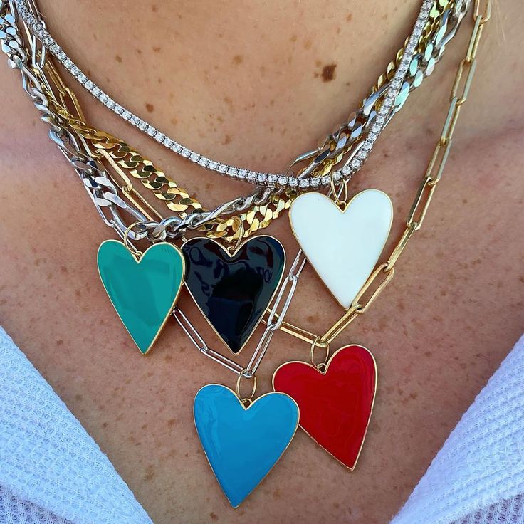 If you like the look of our One Love Charm (and we know you do!), get ready for More To Love. This oversized red heart will steal hearts when slung on your favorite chain and mixed with your signature blend of pendants and charms. Positively bewitching when slung over a LBD, denim jacket, or clean-cut button-down... whatever look the day requires, this lovable piece will rise to the occasion. 14k gold plated sterling silver 26 x 29mm Trendy Red Heart Pendant Jewelry, Trendy Red Heart-shaped Jewelry, Trendy Red Heart Necklace For Valentine's Day, Bold Jewelry With Adjustable Chain For Gift, Trendy Red Jewelry With Heart Charm, Trendy Red Heart Pendant Necklace, Valentine's Day Heart Pendant Jewelry, Trendy Red Charm Necklaces For Valentine's Day, Red Personalized Trendy Necklace