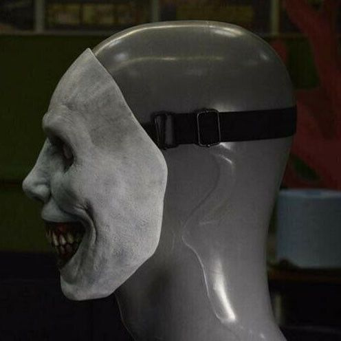 an image of a creepy mask on display