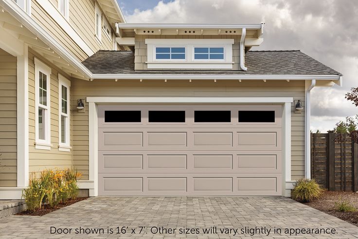 a garage door is shown in front of a house