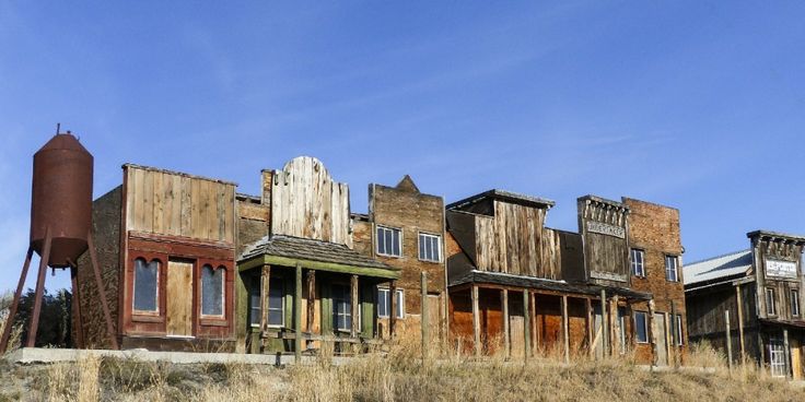 an old abandoned building in the middle of nowhere