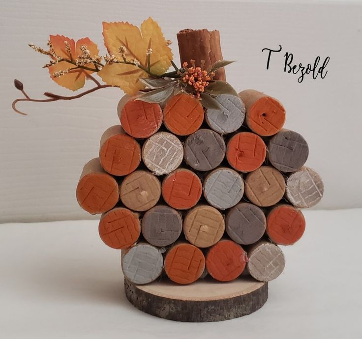 there is a tree made out of wine corks and leaves on the top of it