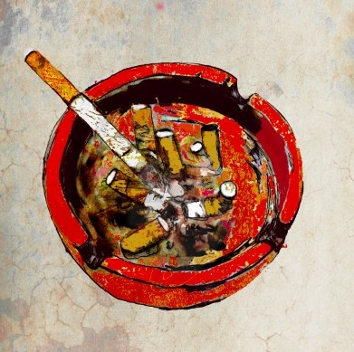 a red bowl filled with food on top of a table