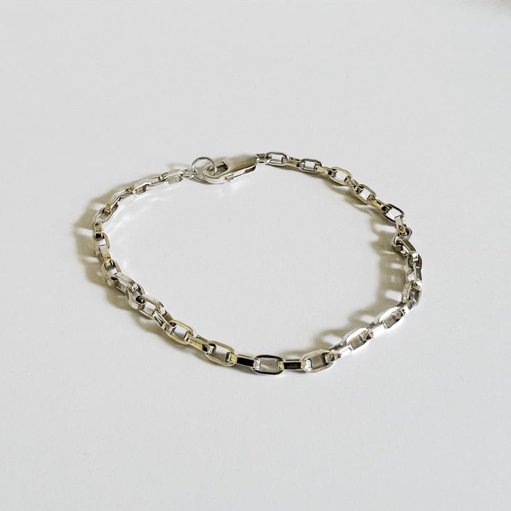 metrix jewelry chunky chain bracelet in sterling silver Classic Everyday Silver Chain Charm Bracelet, Silver Chain Link Charm Bracelet, Classic Silver Chain Charm Bracelet With Oval Links, Sterling Silver Chunky Chain Bracelet, Classic Silver Charm Bracelet With Oval Links, Classic Silver Link Charm Bracelet, Classic Sterling Silver Bracelet With Chunky Chain, Classic Silver Oval Link Charm Bracelet, Silver Charm Bracelet With Oval Link Chain