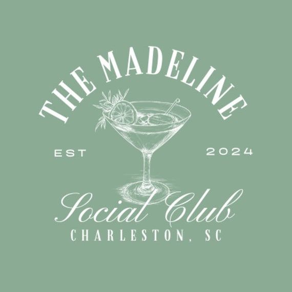 the madeline social club charleston, sc logo on a mint green t - shirt