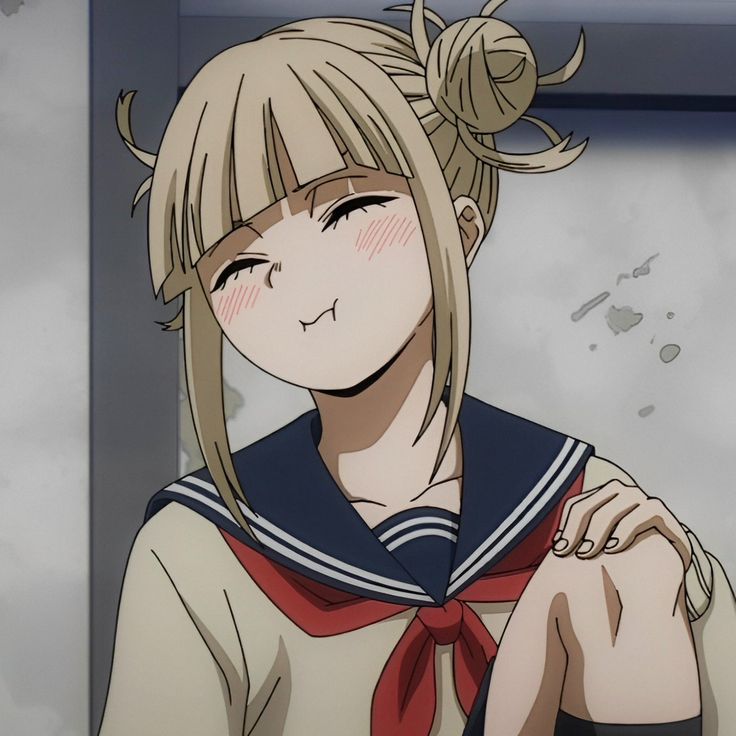 an anime character with blonde hair wearing a sailor's outfit and holding her hand on her shoulder