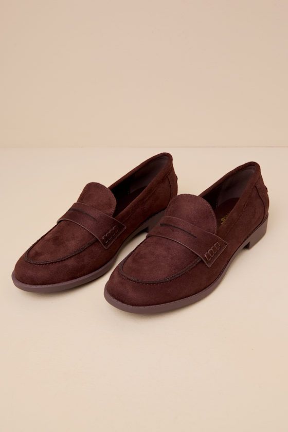 The Lulus Julius Brown Suede Loafer Flats are ready to complete all your chicest office OOTDs! Soft faux suede shapes these sophisticated penny loafers with an almond-shaped upper, a cutout strap at the vamp, and a notched collar. The simple slip-on design makes for effortless styling! Available in whole sizes only. 1" rubber heel. Cushioned insole. Rubber sole has nonskid markings. Man made materials. Imported. Lulus | Julius Brown Suede Loafer Flats | Size 9. Elegant Oxfords With Suede Lining For Work, Chic Suede Loafers For Formal Occasions, Chic Suede Loafers For Formal Wear, Formal Flat Heel Suede Loafers, Suede Loafers With Suede Lining For Work, Suede Loafers With Almond Toe For Business Casual, Classic Suede Loafers For Office, Suede Almond Toe Loafers For Business Casual, Semi-formal Flat Heel Loafers For Fall