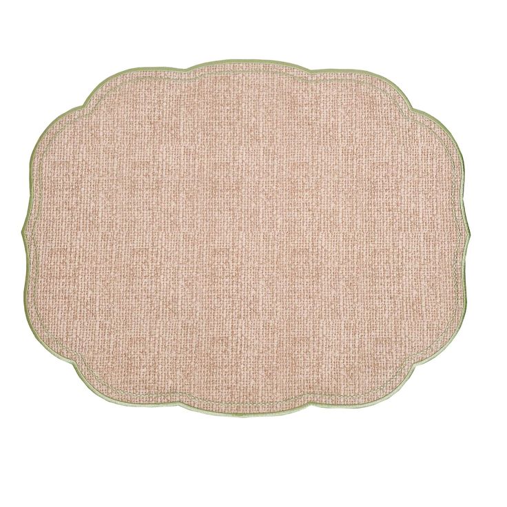 a beige rug with green trim on the edges and an oval border at the bottom