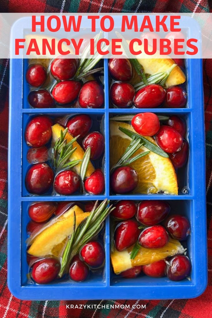 an ice cube tray filled with cherries and lemons