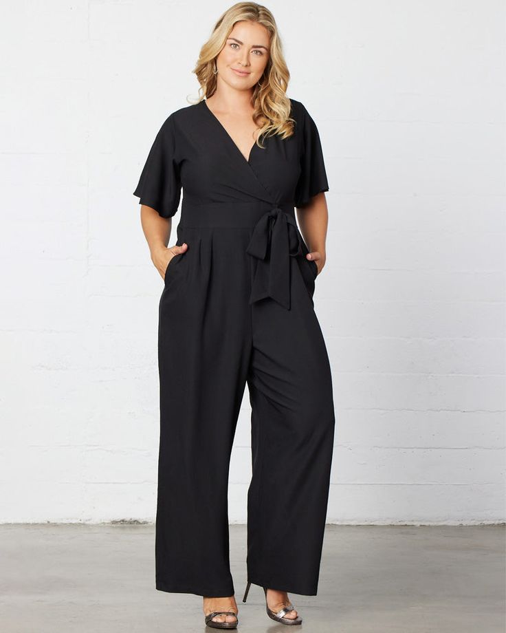 Jump from work to a wedding on the weekend in our Charisma Crepe Jumpsuit. Designed with a surplice neckline, short flutter sleeves and a detachable tie at the waistband. Pleated detail at the front and back of pant adds a tailored appearance. A zipper in the back makes getting in and out a breeze. The ideal jumpsuit for any occasion, you'll love this one and done style. Bride Jumpsuit, Jumpsuit And Cardigan, One And Done, Chic Cardigan, Crepe Jumpsuit, Evening Gown Dresses, Surplice Neckline, Black Tie Wedding, Plus Size Jumpsuit