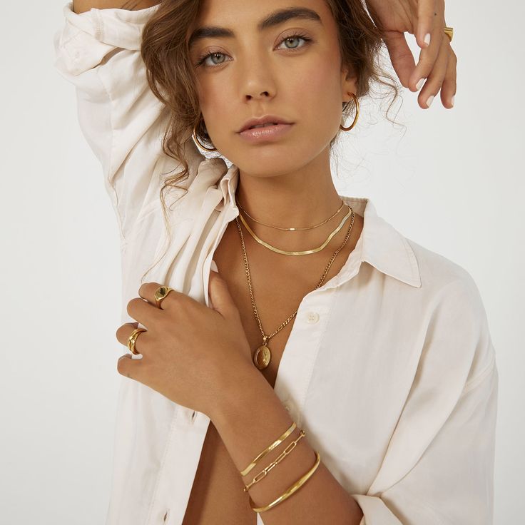 A truely elegant chain with a classy sense of style, our Willa Necklace is perfect for everyday sophistication! With 3 different length from a choker style to a long chain, Willa is designed to be stacked with any other gold or textured pieces to create the layering style of your dreams! 14k Gold (1 micron plating)  Stainless Steel Base  E-coating for a premium finish  Lead & Nickel Free  Tarnish-Free  Water Resistant Modern Jewelry Choker With Chain, Dainty Double Chain Everyday Jewelry, Modern Everyday Snake Chain Bracelet, Trendy Herringbone Necklace With Delicate Chain For Gift, Elegant Herringbone Chain Choker Necklace, Trendy Herringbone Necklace For Everyday, Delicate Chain Herringbone Necklace As Gift, Elegant Multi-strand Necklaces For Everyday, Minimalist Multi-strand Necklace With Adjustable Chain