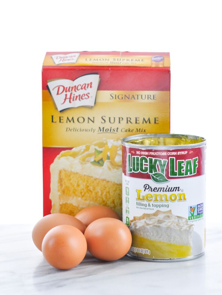 eggs, cake mix and lemon supreme on a counter next to a package of flour