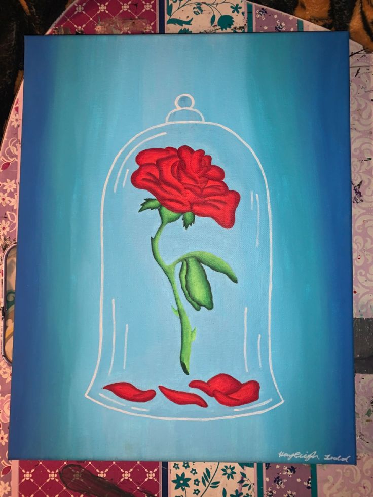 an acrylic painting of a red rose in a glass bell on a blue background