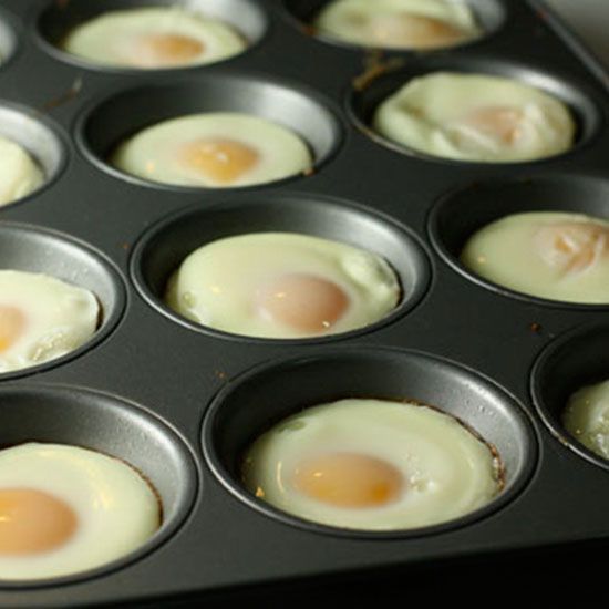 an image of eggs being cooked in a muffin tin