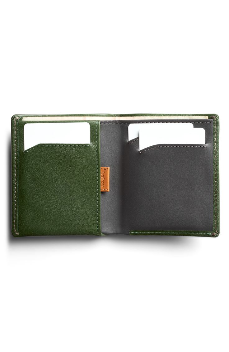 A well-organized interior ensures superior easy and convenience with this RFID-protected wallet. It has a smart pull-tab compartment so you don't have to dig for things, and its made from premium calfskin for lasting appeal. Interior currency pouch; pull-tab slip pocket; three card slots Leather Imported Modern Green Wallet For Business, Versatile Green Wallets With Rfid Blocking, Green Rfid Blocking Card Holder For Everyday, Classic Green Trifold Wallet For Everyday Use, Green Leather Card Holder For Everyday Use, Green Wallets With Interior Card Slots, Everyday Green Wallets With Interior Card Slots, Green Leather Business Wallets, Classic Green Leather Wallets