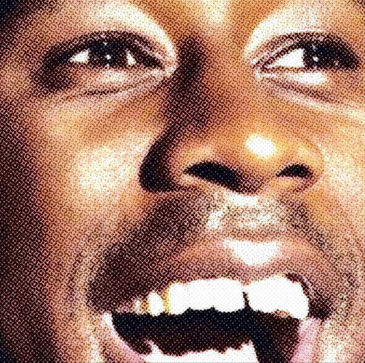 a close up of a person with his mouth open and teeth wide open in front of him