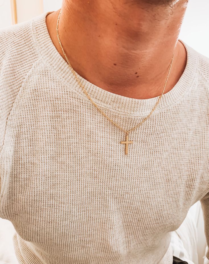 The perfect gift for your man. Our 14k gold filled cross necklace can be made in two lengths. 20 or 22 inch Figaro chain with 25x15mm larger sized 14k gold filled cross. 20 inches is a good universal men’s length. gold filled is waterproof and made to last. *Modeled on a male in 20 inch length. Men Necklace Cross, Mens Cross Necklace Gold, Mens Gold Cross Necklace, Gold Cross Necklace Mens, Male Jewelry Aesthetic, Cross Chain Men, Cross Necklace Aesthetic, Gold Cross Necklace Men, Men Gold Chain