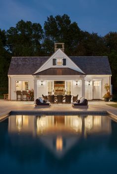 the pool house is lit up at night