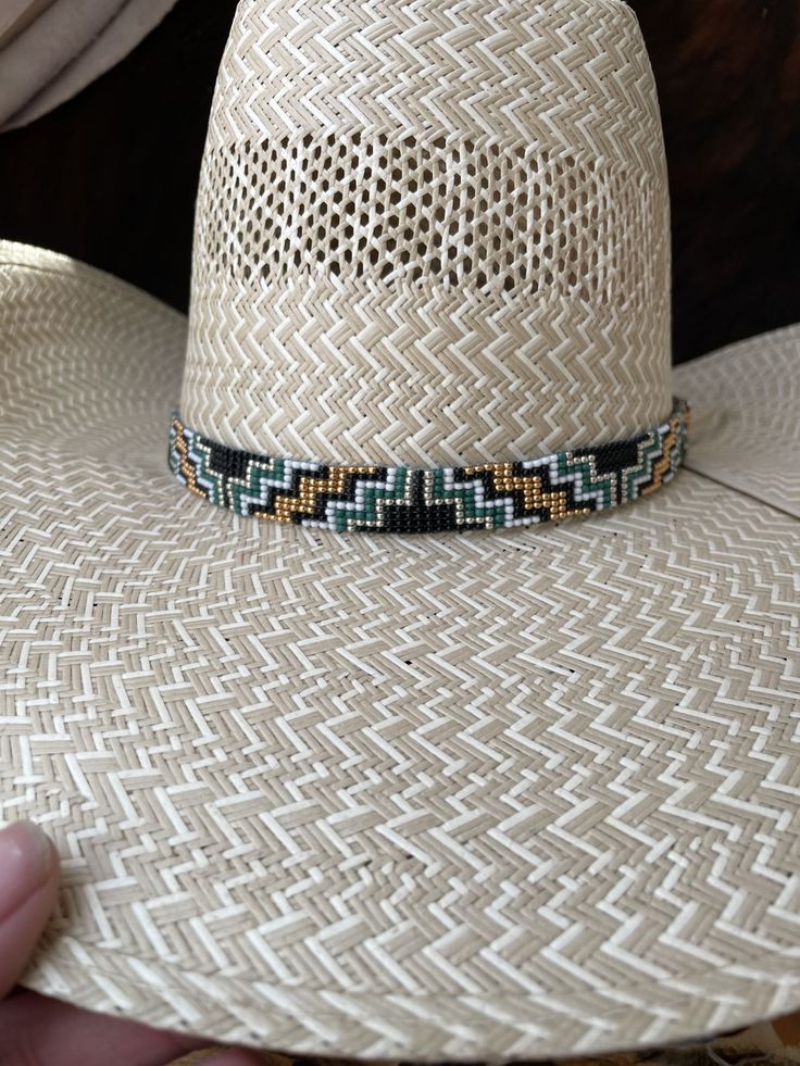 "5/8\" Wide Aztec Green and Gold Hat Band. All beadwork is beaded with 10lb extreme braided nylon line. All hat bands are finished at 23\" with glued than sewed down leather ends and an adjustable leather tie." Adjustable Braided Hat For Rodeo, Adjustable Braided Western Hat, Western Style Adjustable Braided Hat, Handwoven Adjustable Hat With Short Brim, Adjustable Handwoven Hat With Short Brim, Adjustable Woven Straw Hat For Ranch, Traditional Adjustable Handwoven Hat Bands, Adjustable Woven Sun Hat For Rodeo, Adjustable Handwoven Short Brim Hat