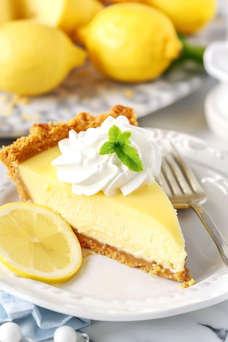 a slice of lemon pie on a white plate