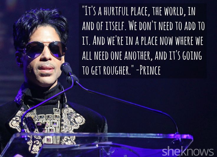 a man in sunglasses standing at a podium with a quote from prince on the side