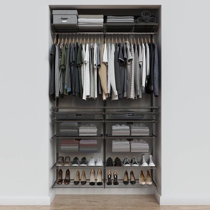 an organized closet with clothes and shoes