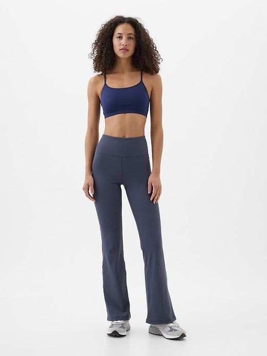 GapFit Sky High Studio Ribbed Flare Leggings Versatile Moisture-wicking Stretch Activewear, Stretch Nylon Activewear, Versatile Solid Stretch Activewear, High Stretch Seamless Gym Pants, Versatile Solid Activewear With Stretch, Solid Athleisure Activewear With Stretch, Sporty High Stretch Seamless Pants, Sporty Seamless High Stretch Pants, Stretch Seamless Workout Pants