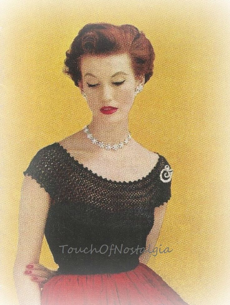 a woman in a black and red dress with pearls on her head is looking down