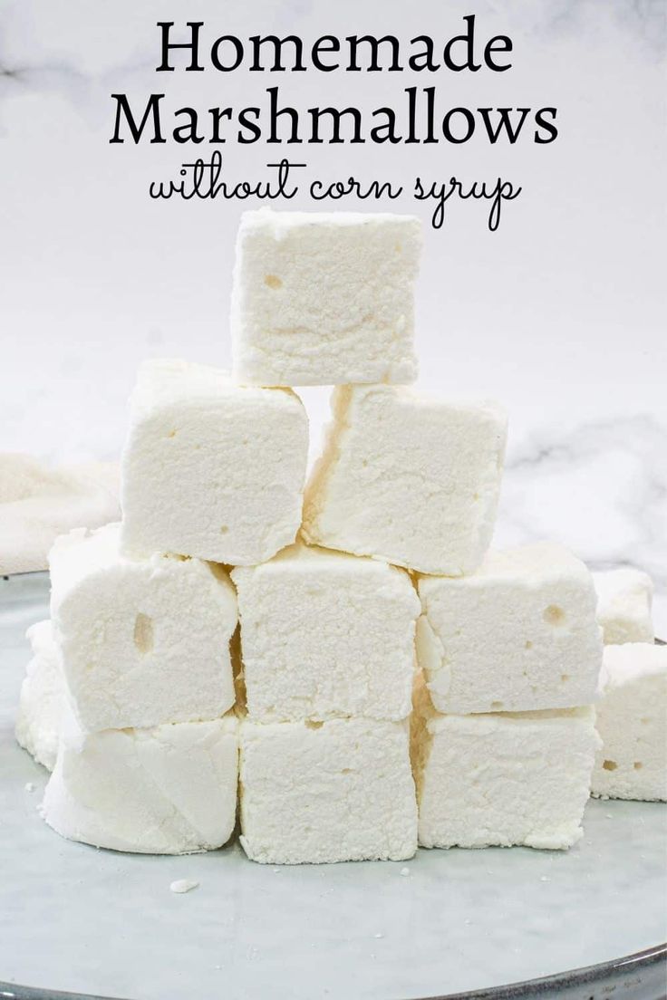 homemade marshmallows stacked on top of each other with text overlay that reads homemade marshmallows without corn syrup