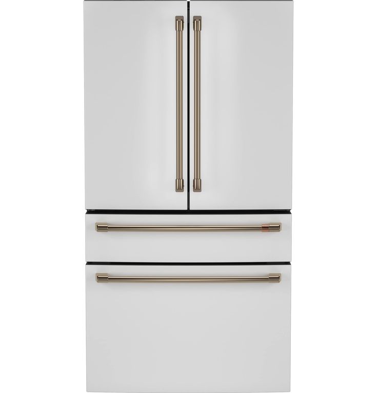 a white refrigerator freezer sitting inside of a kitchen