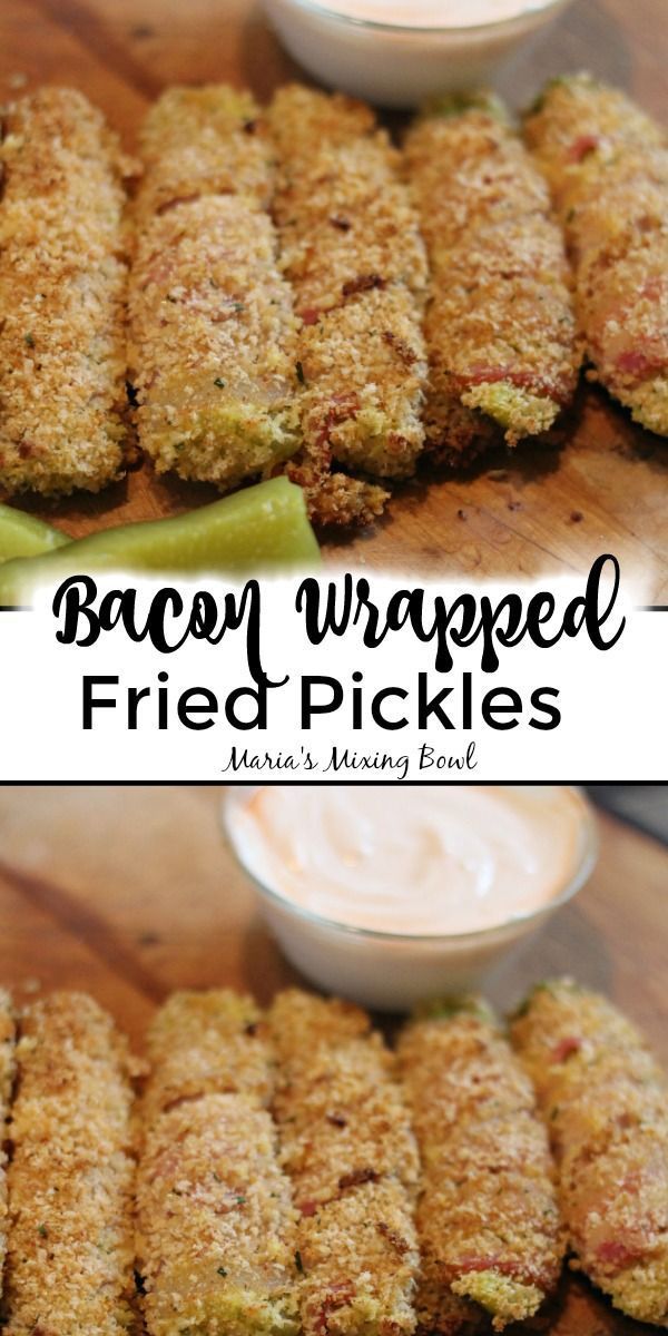 bacon wrapped fried pickles on a cutting board with ranch dips in the background