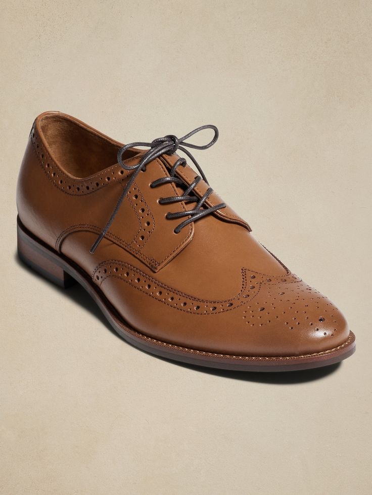 Brogue Oxford Dress Shoe | Banana Republic Factory Brown Lace-up Dress Shoes With Brogue Detailing, Semi-formal Oxfords With Perforated Toe Box, Brown Laced Oxfords For Derby, Goodyear Welted Lace-up Oxfords For Business Casual, Oxford Wingtip Dress Shoes With Laces, Leather Oxford Shoes With Brogue Detailing, Semi-formal Lace-up Oxfords With Perforated Toe Box, Elegant Lace-up Brogue Shoes With Moc Toe, Elegant Lace-up Shoes With Brogue Detailing And Moc Toe