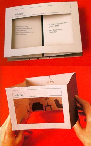 an open book with two pictures inside and one in the middle, on a red surface