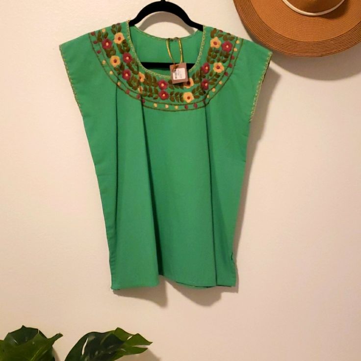 Happy Dia De Independencia! Purchased This Top At A Boutique. Its A Green/Teal Color. Runs As A Small Size With No Stretch To Fabric. The Embroidery On This Top Is Gorgeous. Green Traditional Embroidered Top For Spring, Traditional Green Embroidered Top For Spring, Green Folk Style Embroidered Top With Floral Embroidery, Folk Style Green Embroidered Top With Floral Embroidery, Green Embroidered Folk Blouse, Casual Green Embroidered Top With Floral Detail, Casual Green Floral Embroidered Top, Casual Green Top With Floral Embroidery, Casual Green Embroidered Cotton Top