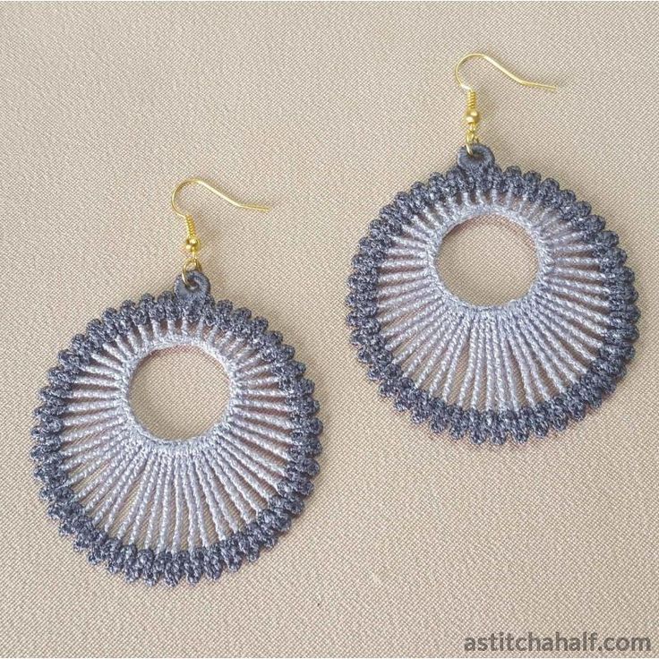 two pairs of blue and white crocheted earrings