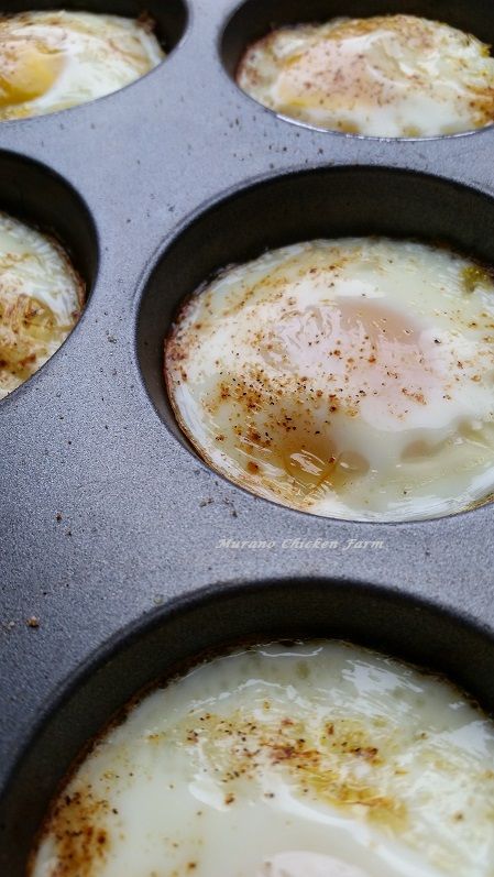 eggs in a muffin tin with cinnamon on top