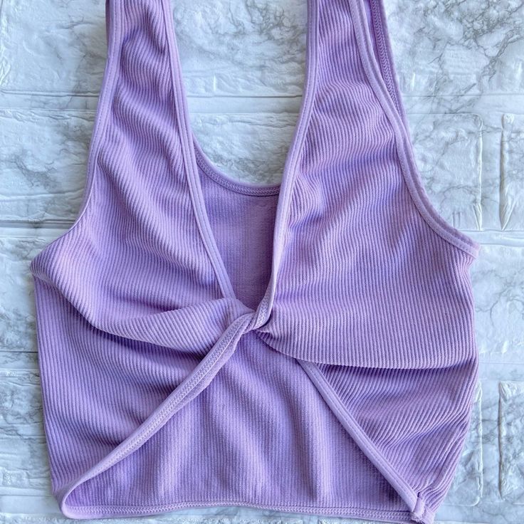 85% Micromodal 7% Nylon 8% Spandex Twist Style Sleeveless Reversible One Size New Without Tag Purple Crop Top For Summer Workout, Purple Workout Crop Top, Purple Workout Crop Top For Summer, Purple Tank Top For Summer Loungewear, Summer Purple Tank Top For Loungewear, Purple Seamless Sleeveless Top, Spring Lavender Sleeveless Crop Top, Purple Seamless Crop Top For Summer, Lavender Stretch Sleeveless Top