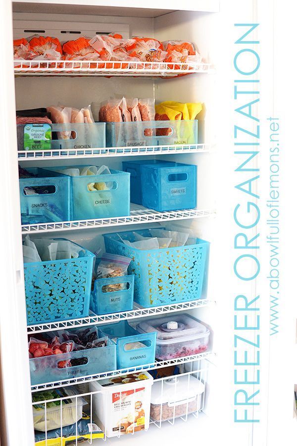 an organized pantry with plastic containers and bins on the shelves, labeled'freezer organization '